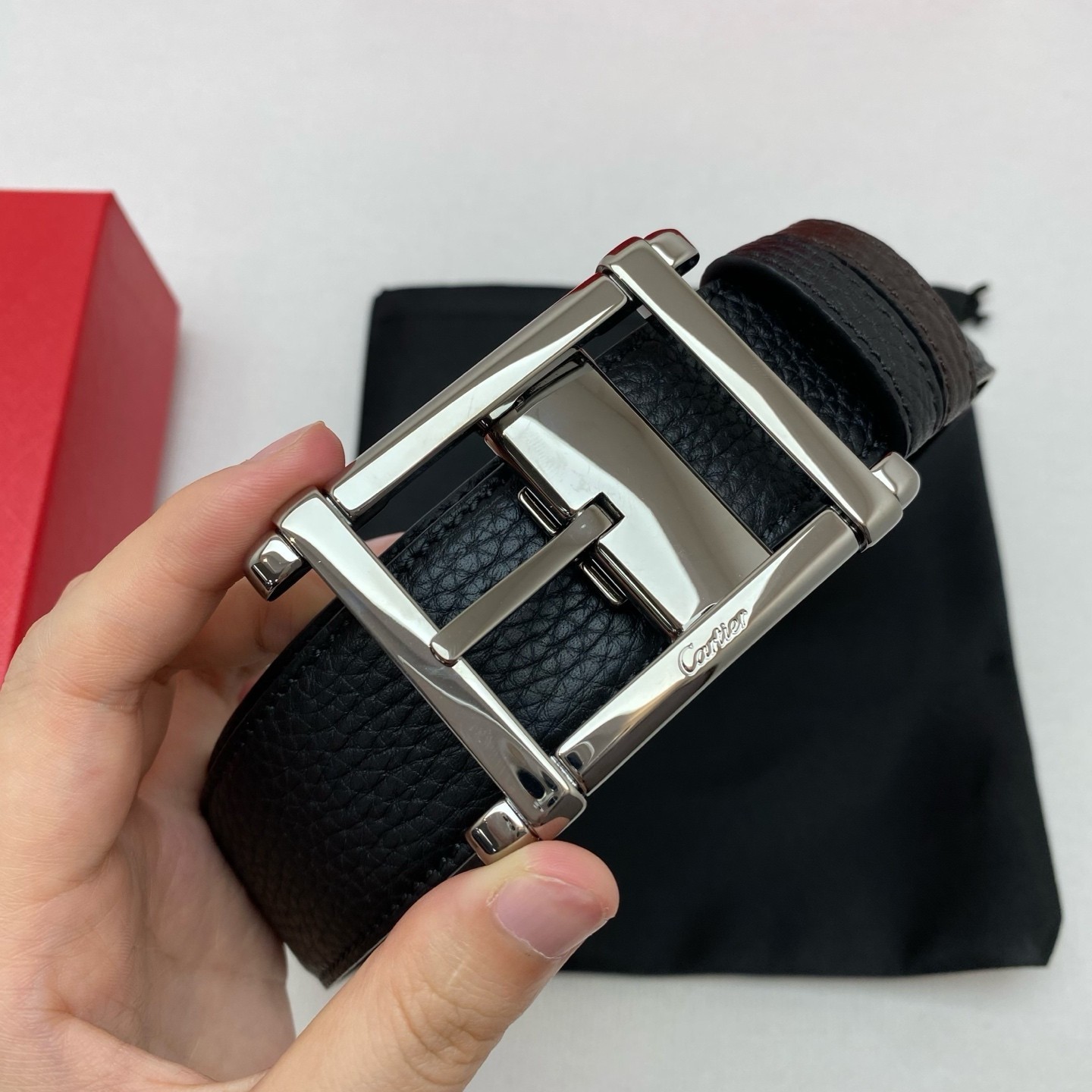 Cartier Black and brown double-sided cowhide men’s Lead colored buckle belt