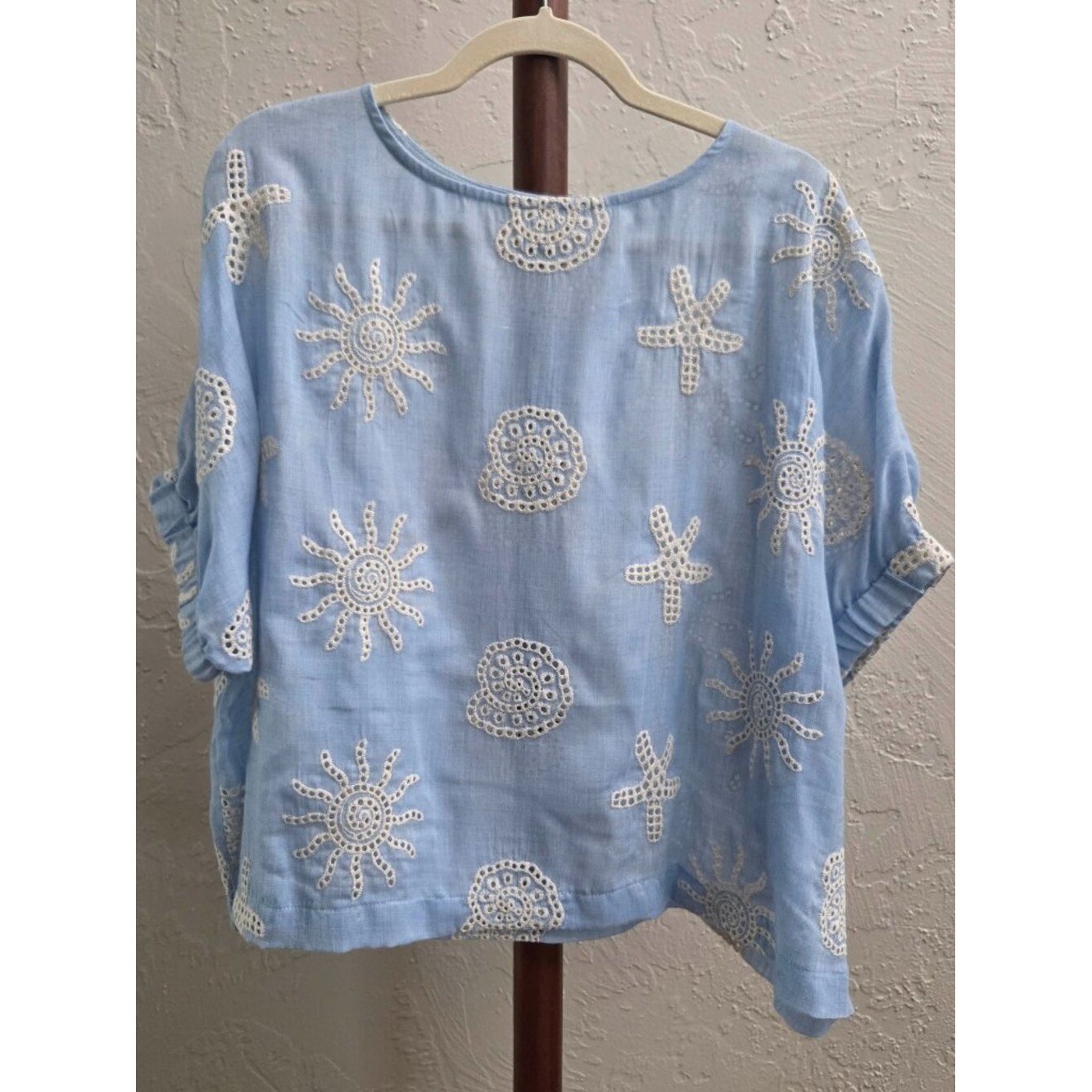T33. Coastal Embroidered Eyelet Blue Top