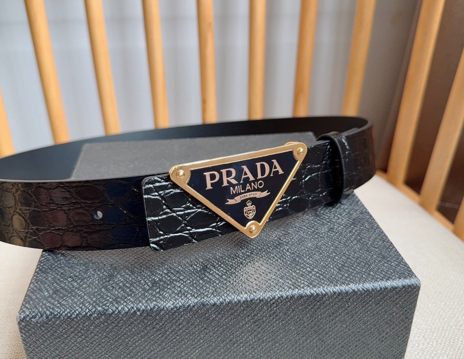 Prada men’s black-button black leather belt