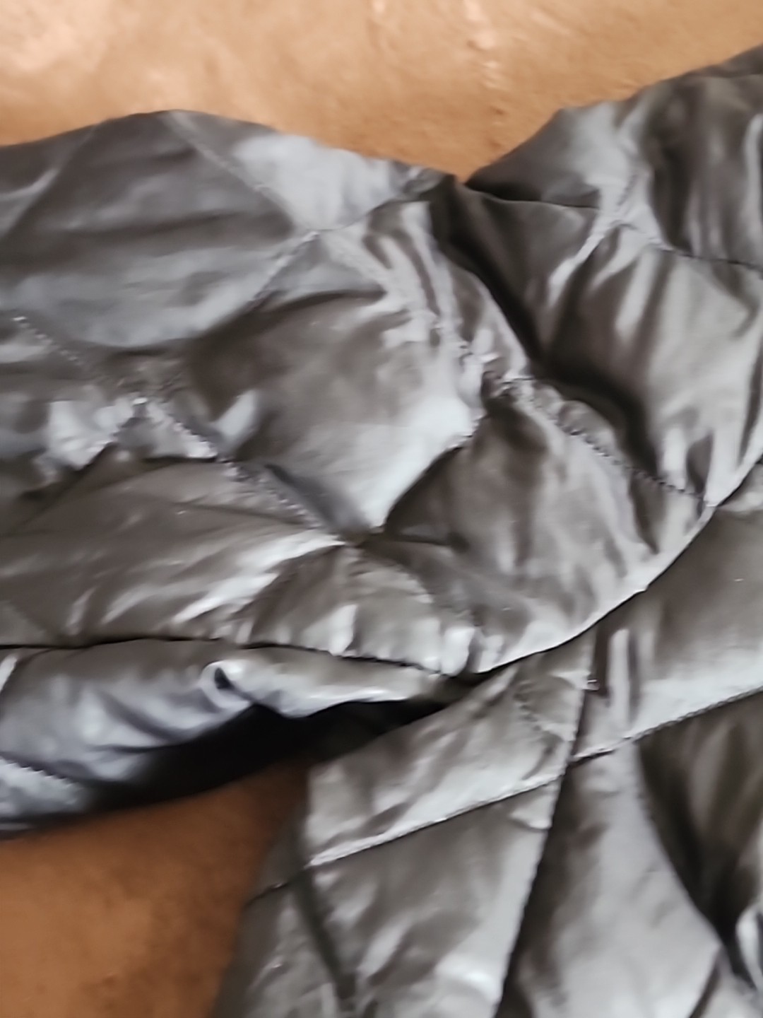 Target Brand: UN1 QLO. SZ .S .WATER.SNOW PROOF. SF.BLACK .VERY LIGHT. POUCH.