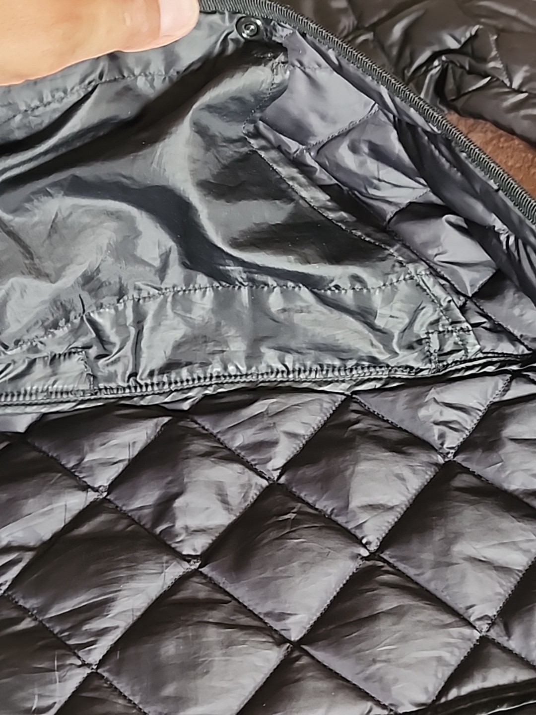 Target Brand: UN1 QLO. SZ .S .WATER.SNOW PROOF. SF.BLACK .VERY LIGHT. POUCH.