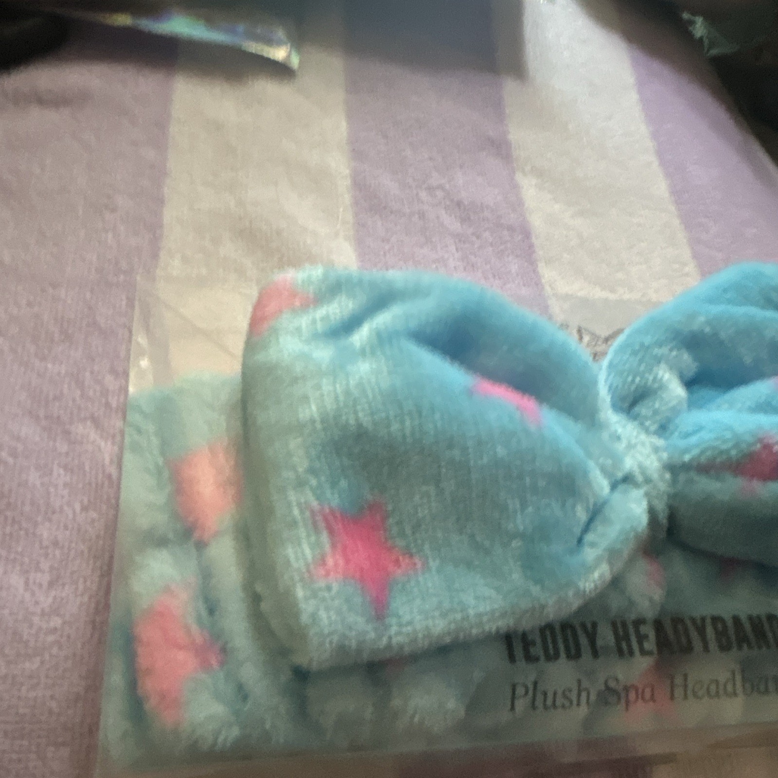 the Crème shop Plush Spa Headband, Blue Pink Stars Pattern Bow Accent