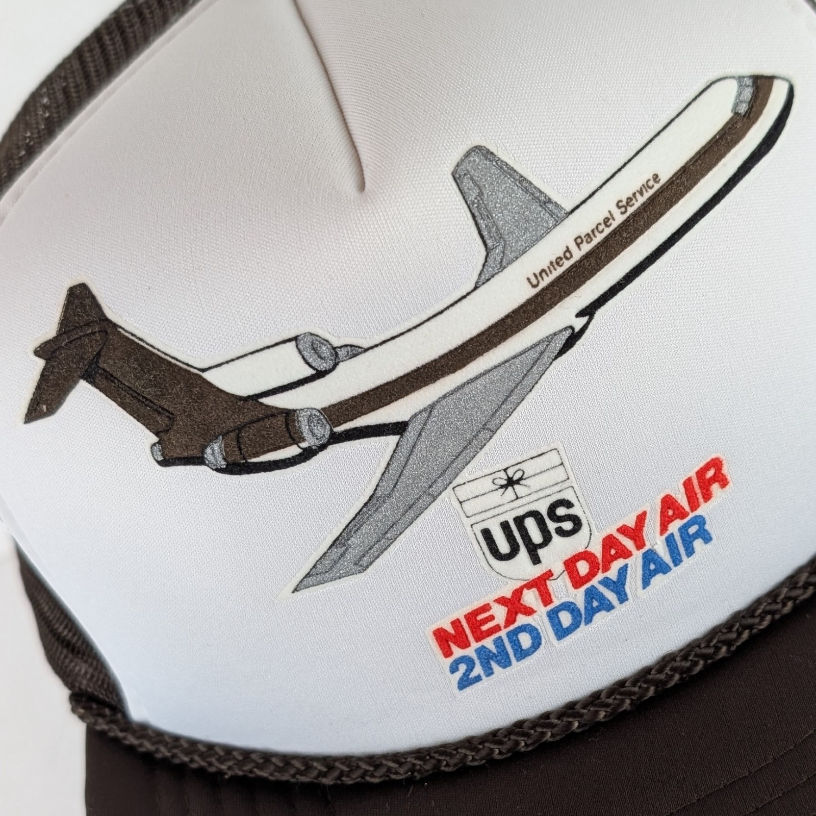 Vtg UPS Next Day Air Mesh Snapback Trucker Hat Brown White Airplane Plane 80s 90