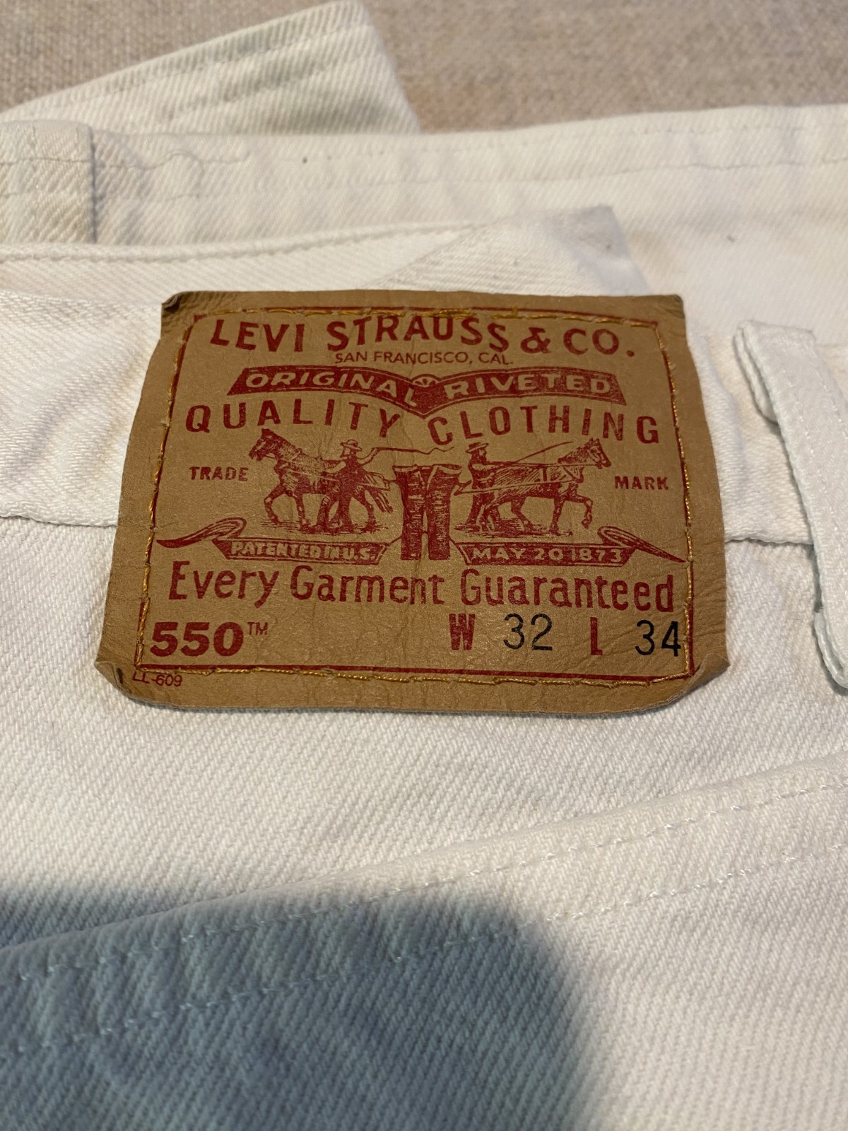 Vintage White Levi’s 550 USA | Every Garment Guaranteed | W32 L34