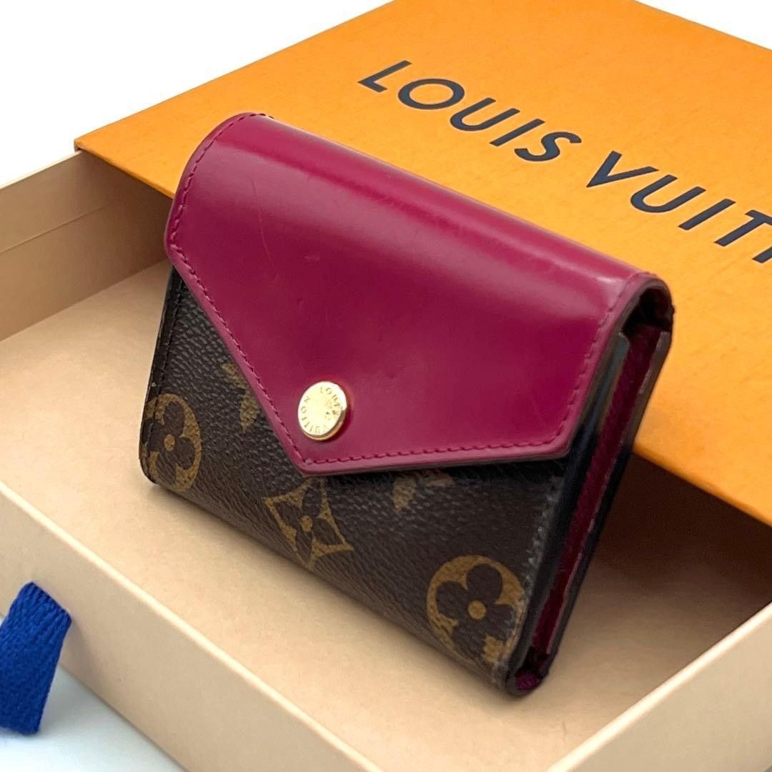 LOUIS VUITTON Wallet: Portefeuille Zoe M62932 Brown Fuchsia W9.7H7.7D2.5cm w/NA;